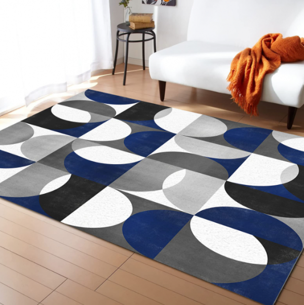 Pola geometris pada permadani dan bantal